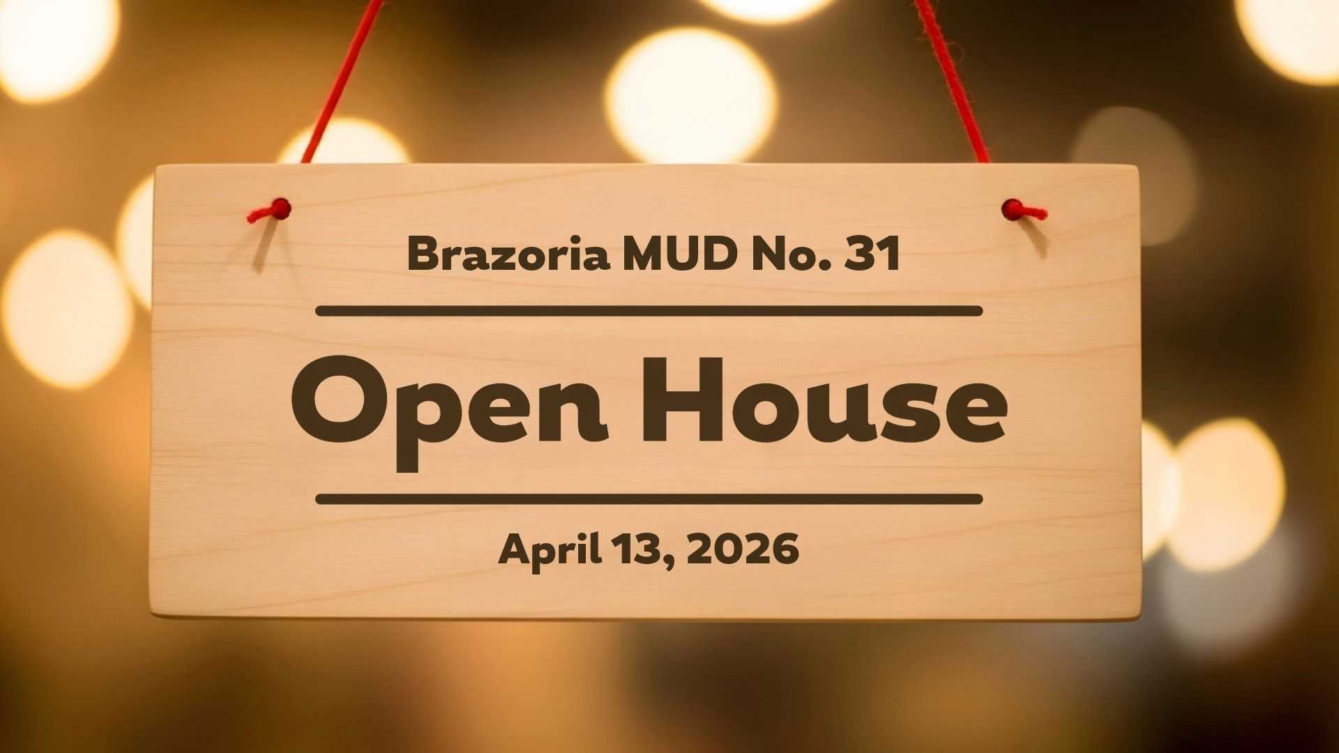 A wooden sign hanging against a blurred background of warm bokeh lights. The sign features the text Brazoria MUD No. 31, followed by a large OPEN HOUSE, and April 13, 2026 from 6 pm to 7:30 pm.